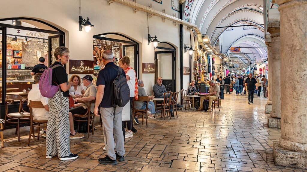 Shoppers walking through the vaulted halls of Istanbul's Grand Bazaar