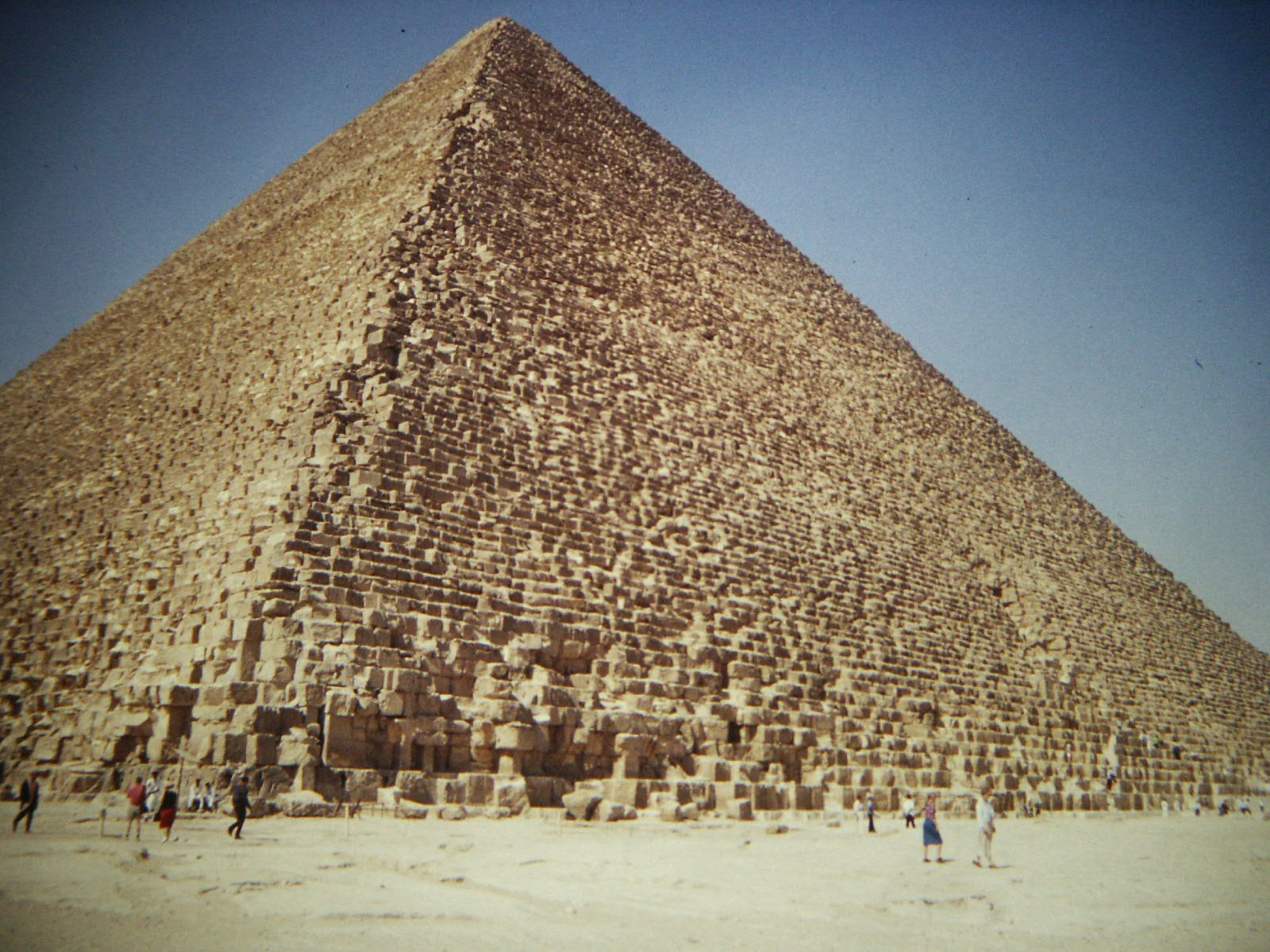 The pyramids of Giza rising above the desert plateau on the edge of Cairo