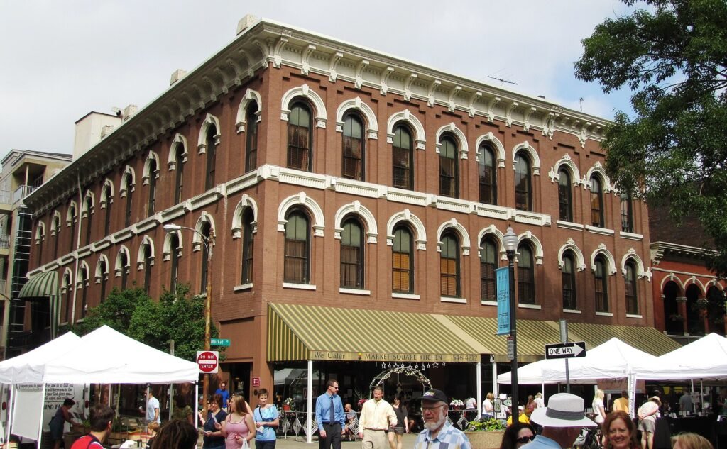 Outdoor restaurant seating and historic storefronts on Market Square in downtown Knoxville
