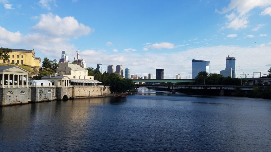 The Philadelphia skyline rising above the Schuylkill River and Boathouse Row