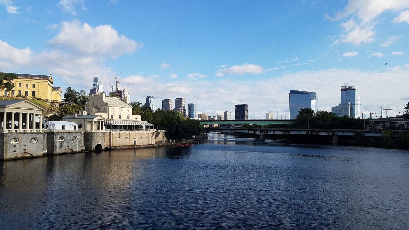 The Philadelphia skyline rising above the Schuylkill River and Boathouse Row
