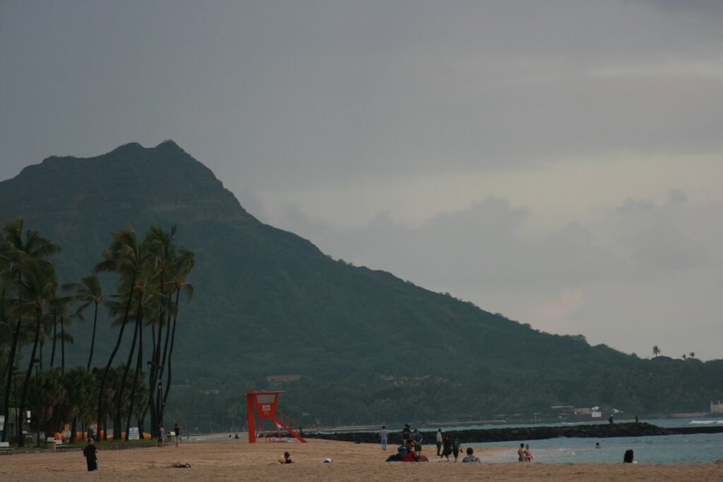 Waikiki Beach with swimmers and Diamond Head crater in the background